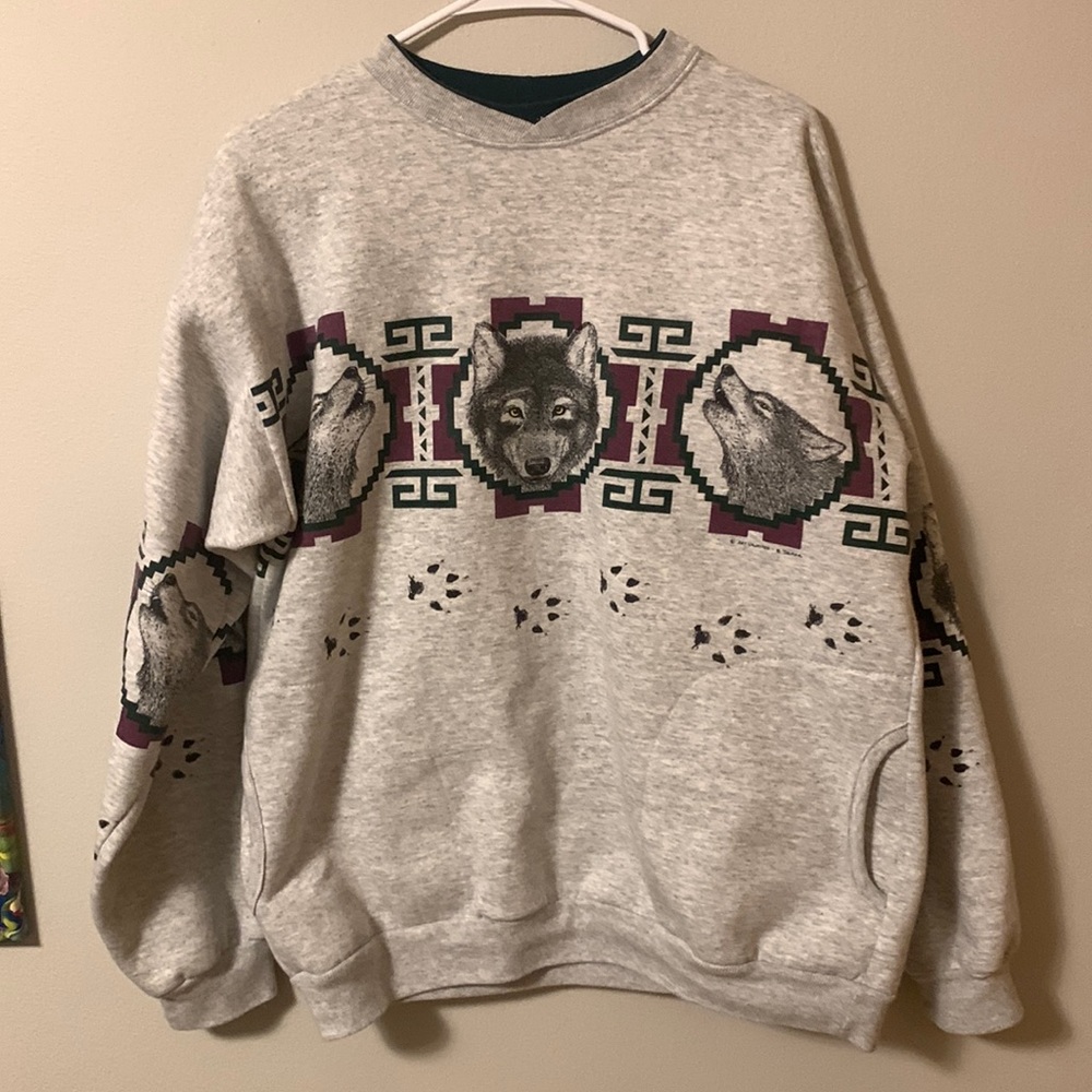 Art unlimited pocketed wolf crew neck